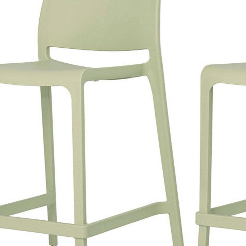 HomeRoots Set of Four 26  Green Heavy Duty Plastic Low Back Outdoor Counter Height Bar Chairs